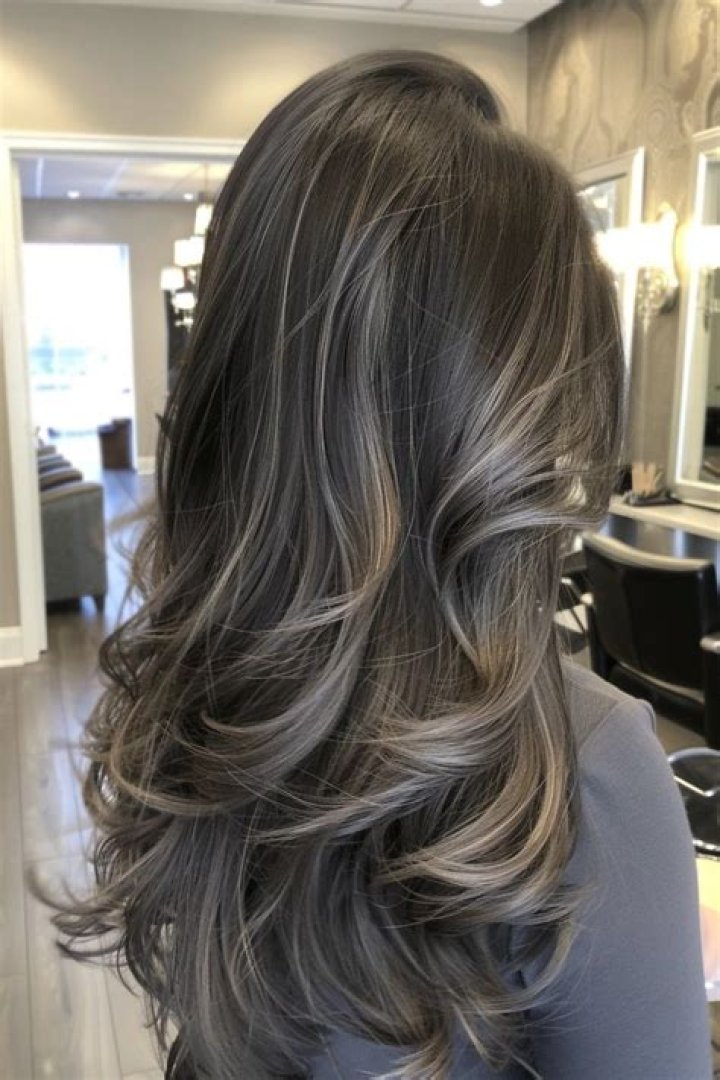 Embracing Elegance: The Allure of Dark Hair with Gray Highlights
